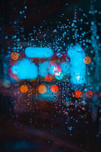 雨点飞溅的玻璃窗(rain splattered glass window)